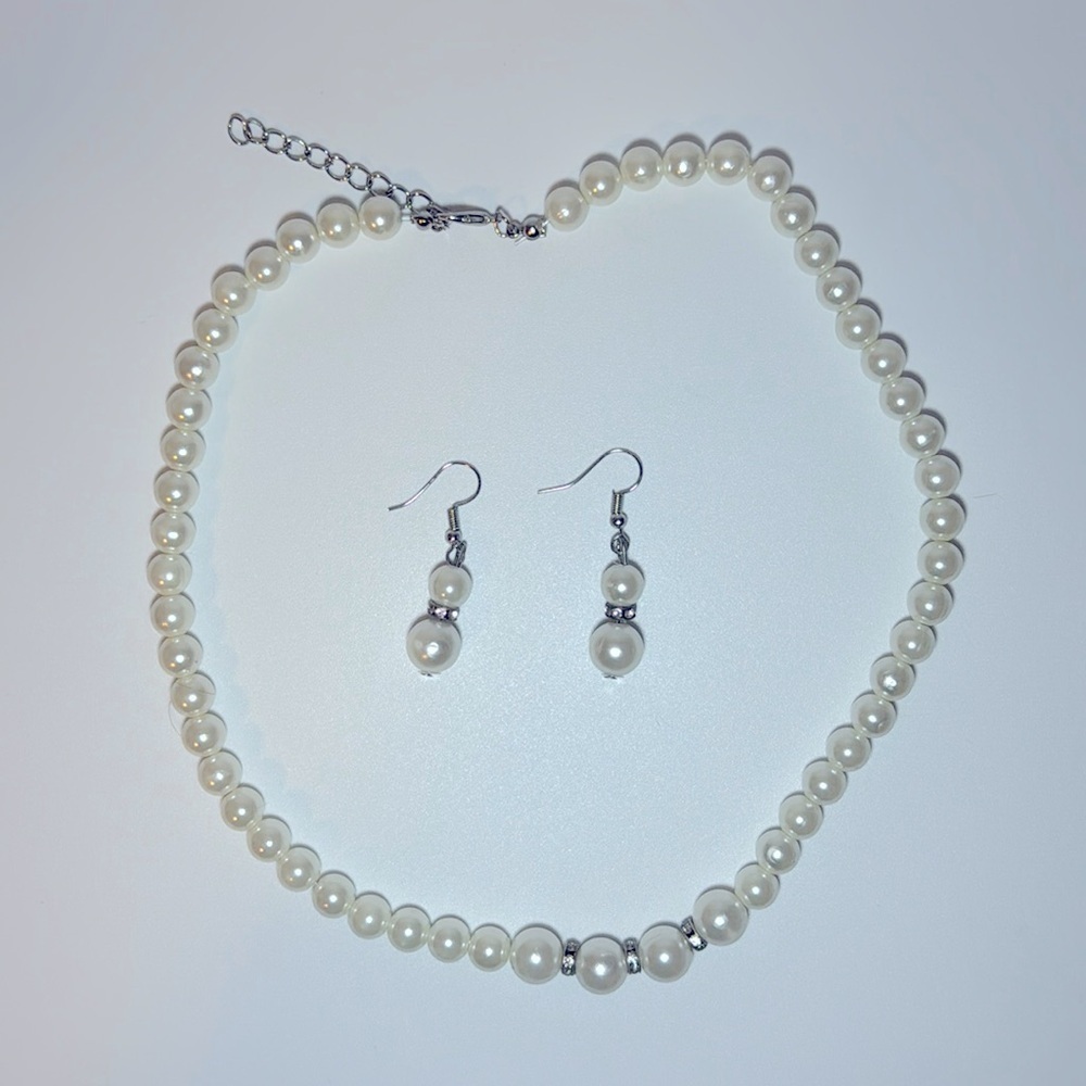 Costume pearls with drop earrings